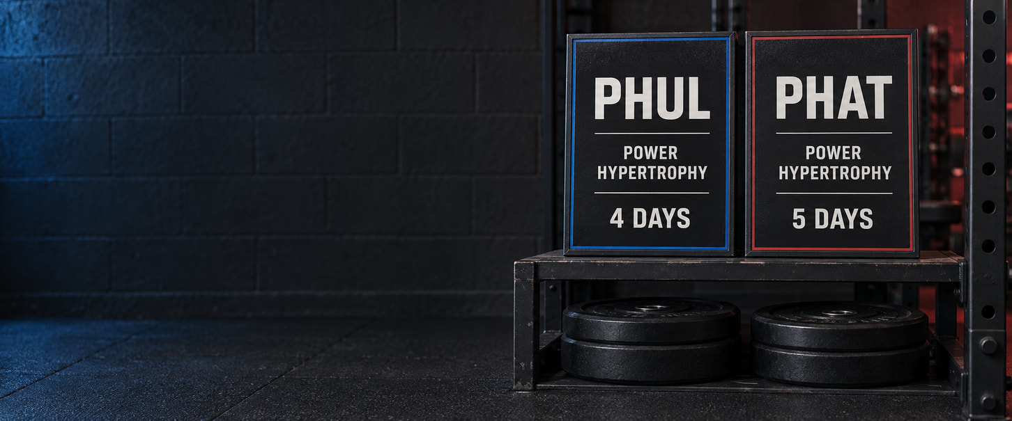 PHUL four-day and PHAT five-day training boards above weight plates in a gym.